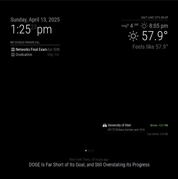 The EchoGlass mirror screen. Showing weather, calendar, the time and rotating news headlines.